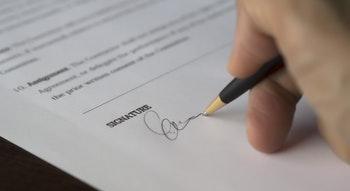 person signing contract